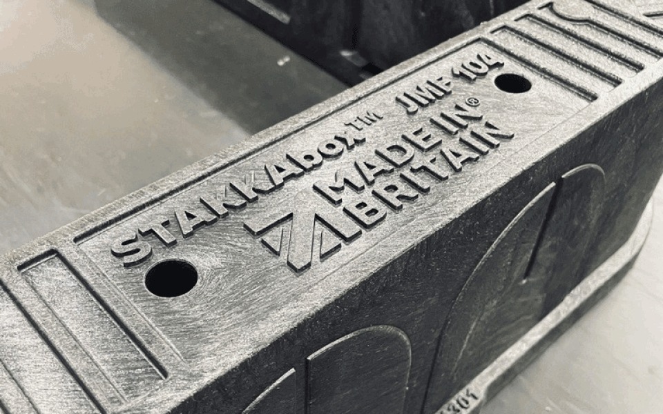 Close-up of a Cubis Stakkabox chamber section embossed with the Made in Britain stamp